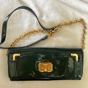 Juicy couture beautiful deep green bag / wallet with adjustable/removable strap.